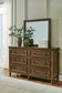 Sturlayne King Upholstered Panel Bed, Dresser, Mirror, Chest and Nightstand